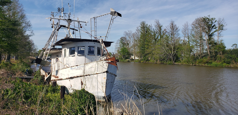 Boat along the shore of Bayou LaFourche